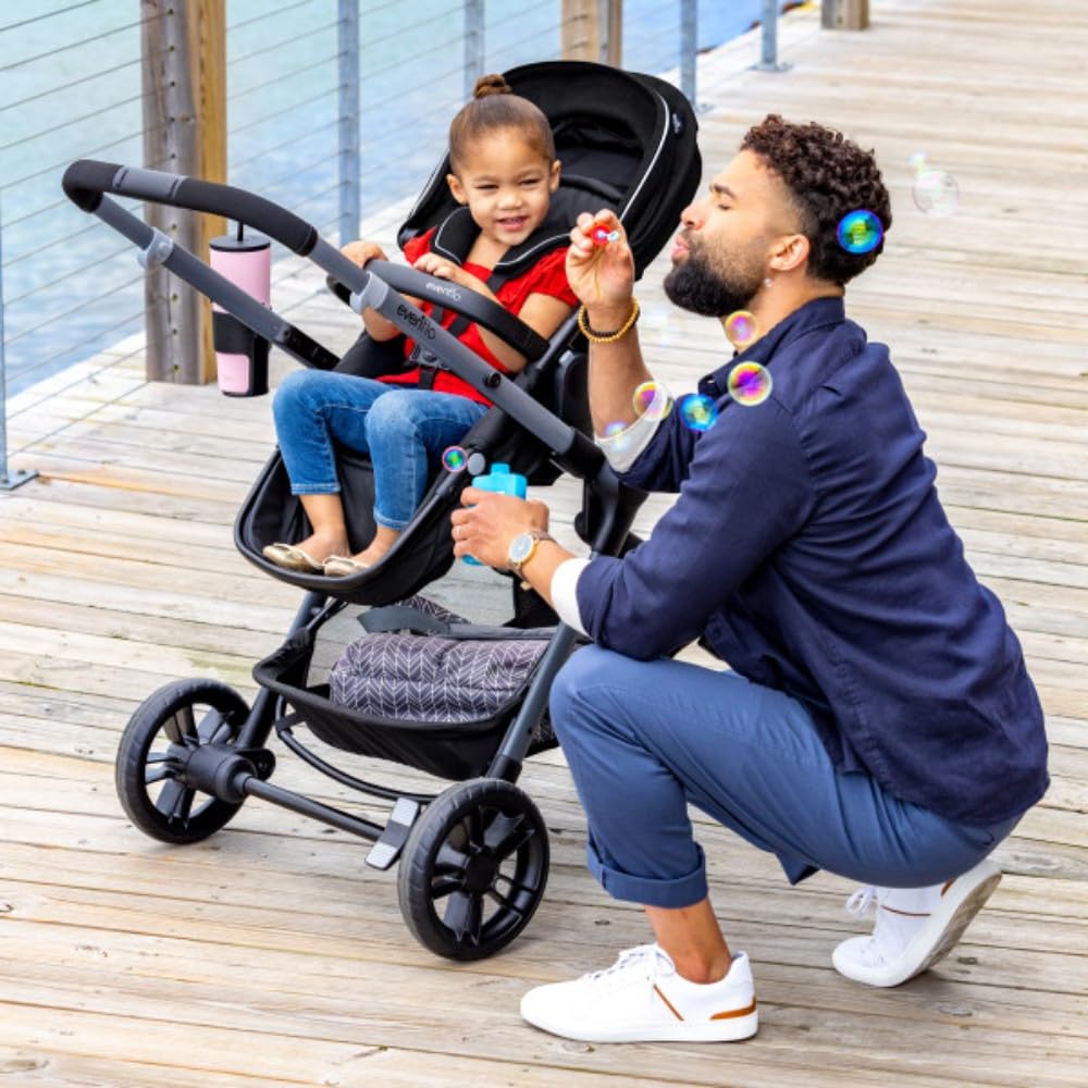 Sistema de transporte modular Evenflo Pivot Xpand con asiento de co...