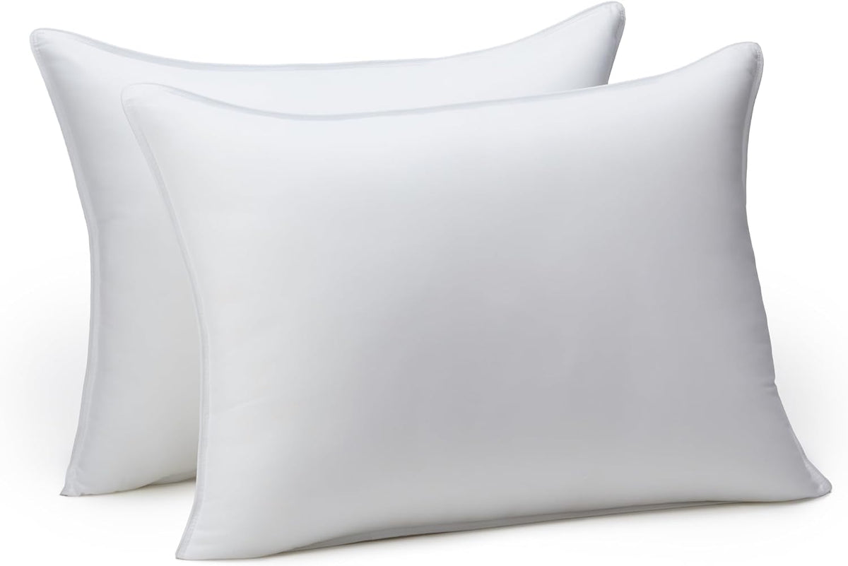 Amazon Basics Almohadas alternativas de plumón para dormir boca aba...