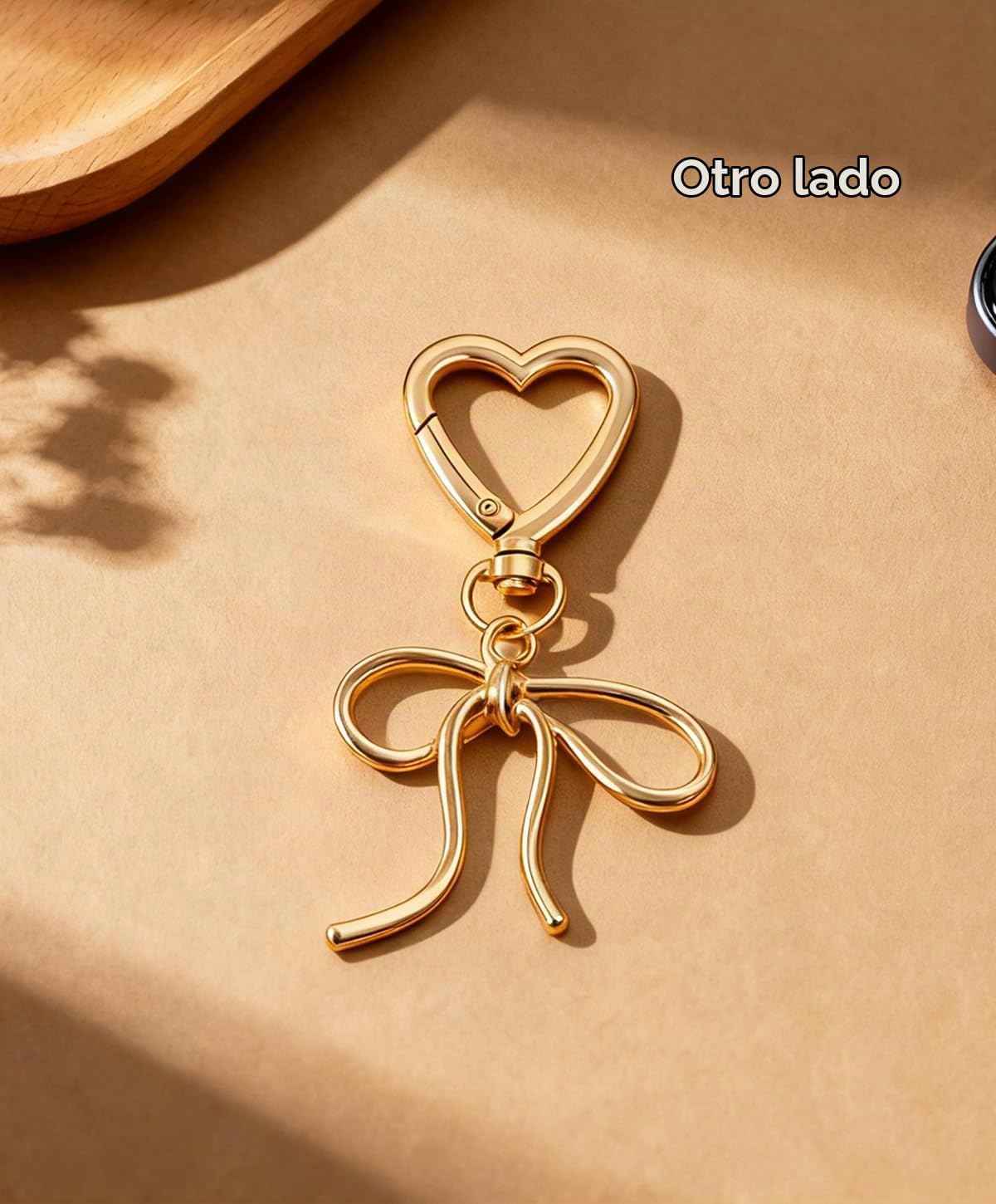 Rikhiua Lindo llavero de lazo elegante con dije de corazón para muj...
