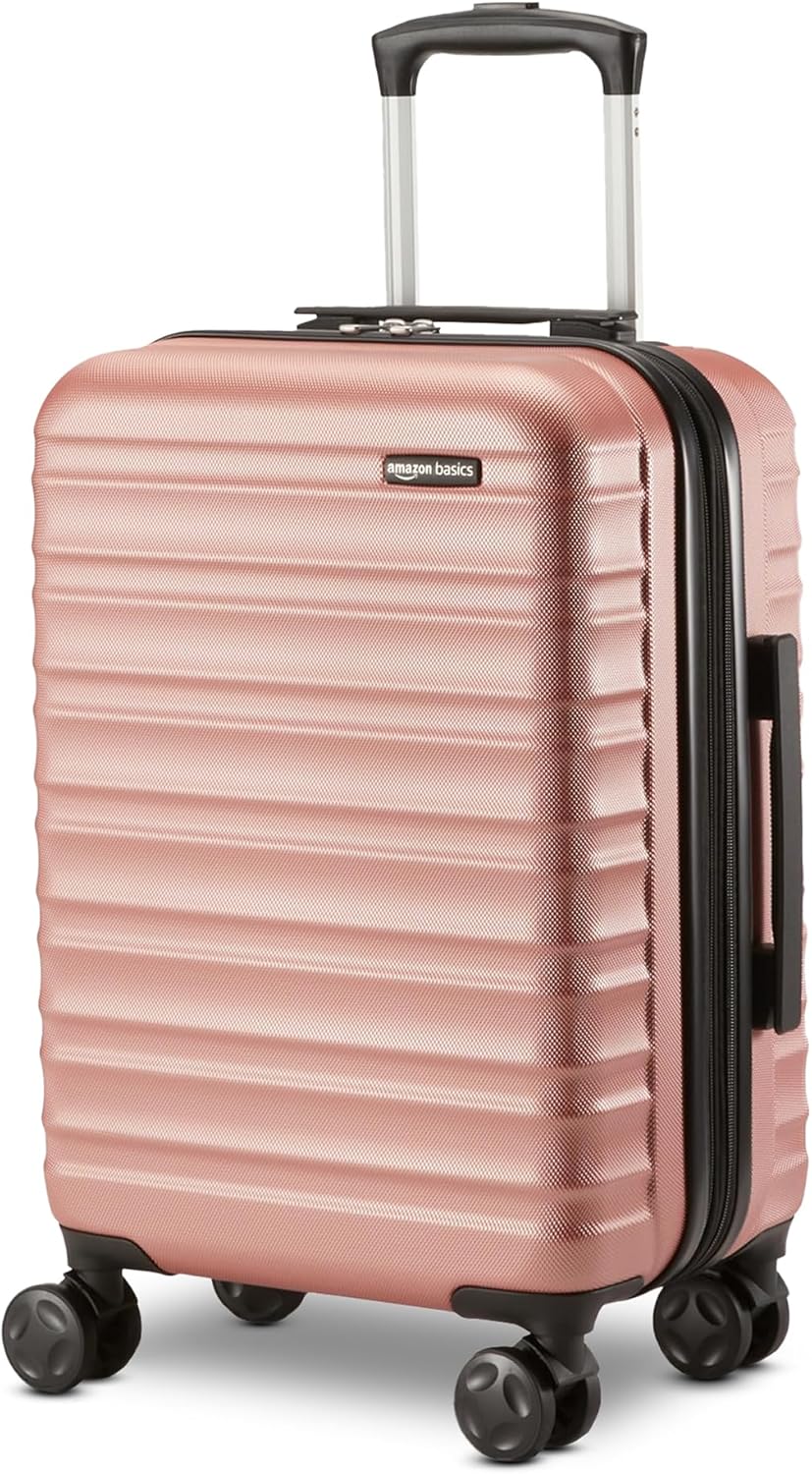 Amazon Basics Maleta rígida giratoria, equipaje de mano expandible...