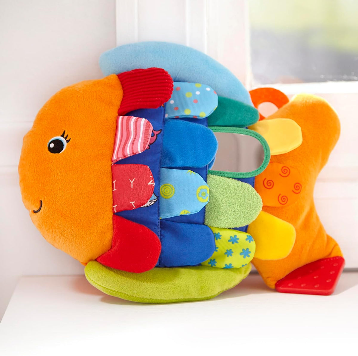 Melissa &amp; Doug Flip pescado suave juguete de bebé.