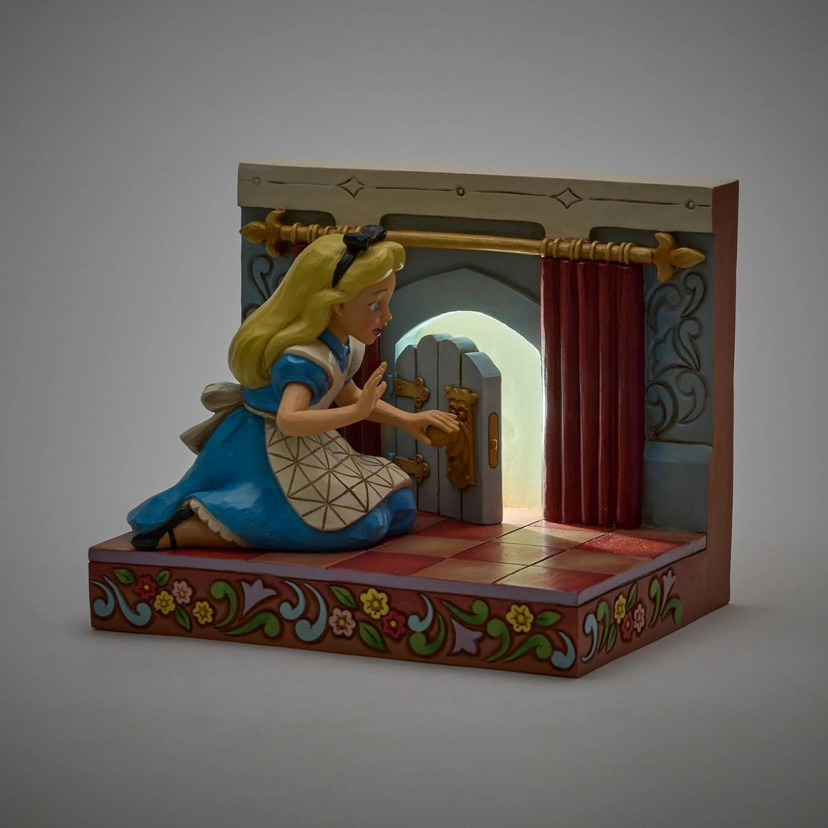 Enesco Disney Traditions by Jim Shore - Figura iluminada de Alicia...