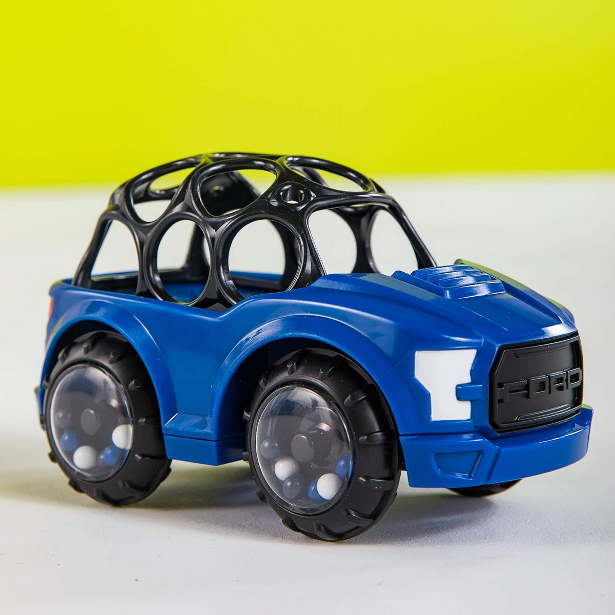 Bright Starts Ford Rattle & Roll F-150 Raptor Vehículo de juguete d...