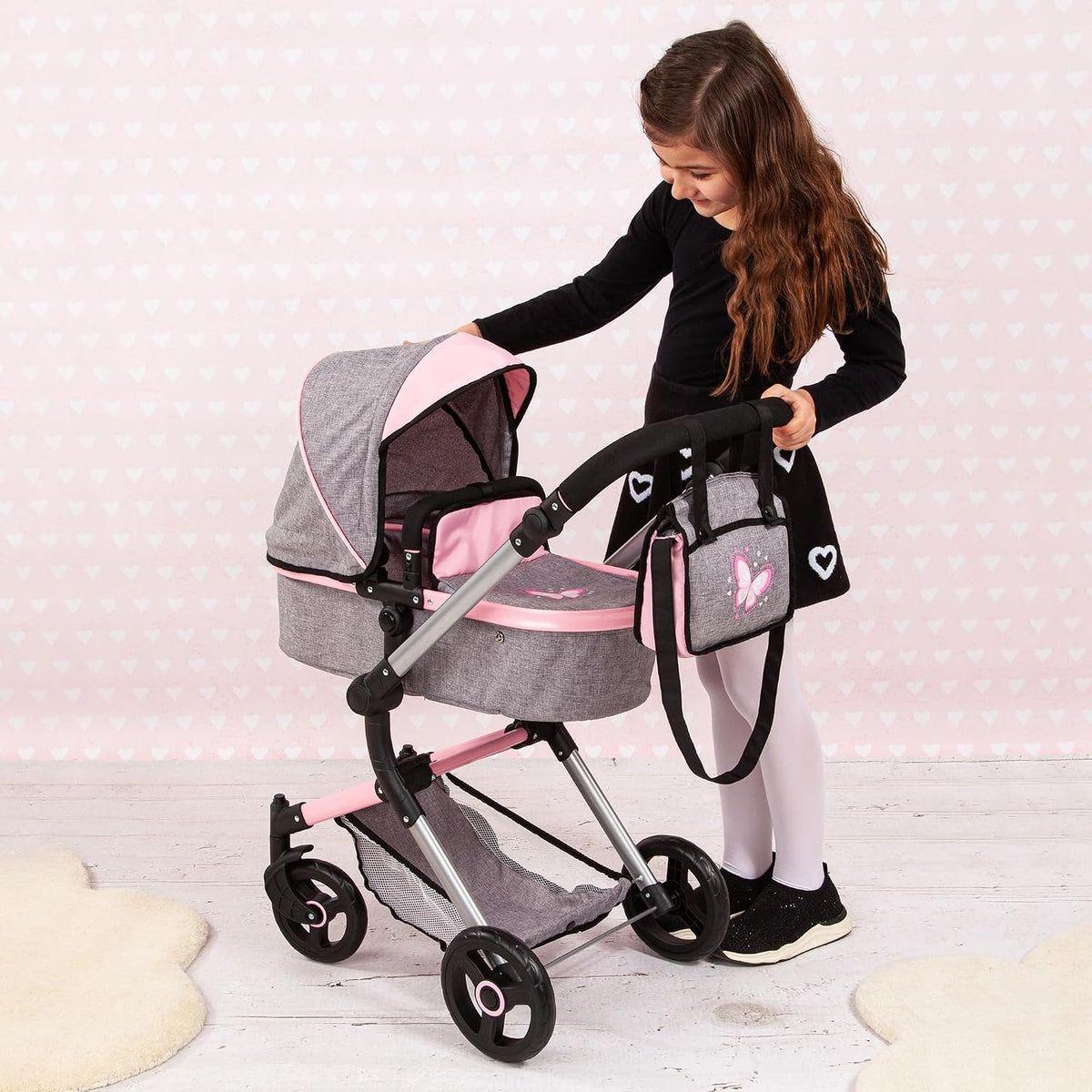 Bayer: Cochecito versátil City Vario - Gris y rosa con mariposa par...