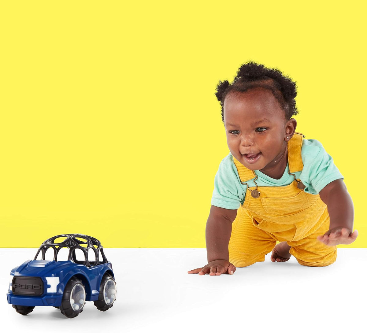 Bright Starts Ford Rattle & Roll F-150 Raptor Vehículo de juguete d...