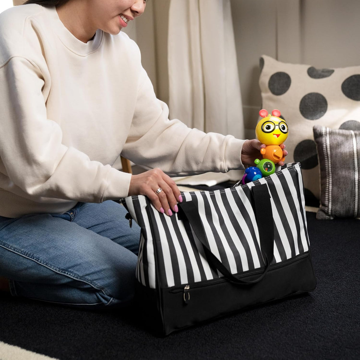 Baby Einstein Twist-a-Pal Cal - Juguete sensorial con música y caza...