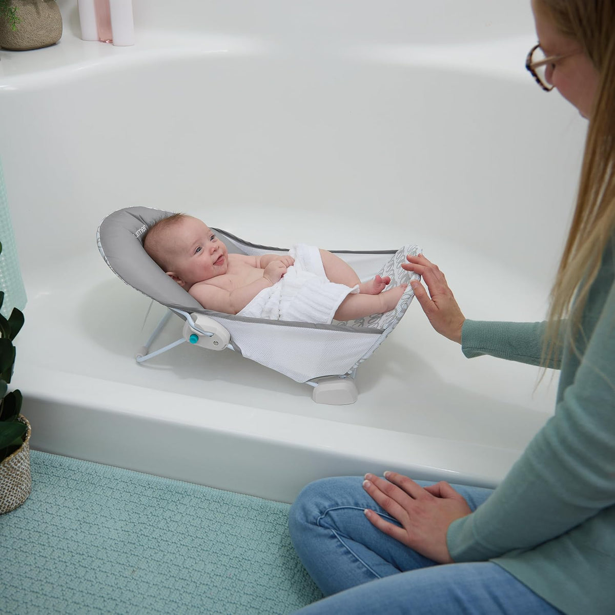 Ingenuity - Asiento plegable de baño para bebé de 2 posiciones, sop...