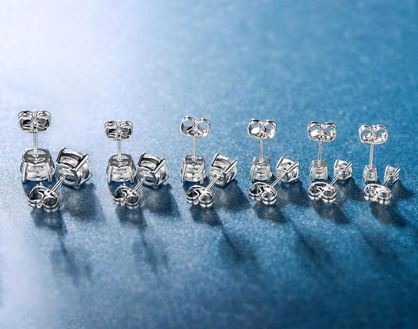 Aretes tipo dormilona chapados en oro blanco de 18 quilates con cir...