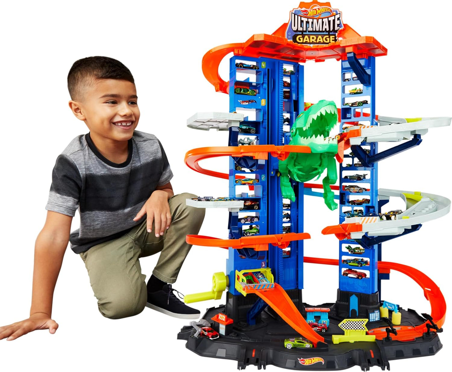 Hot Wheels Ultimate Garage Track Playset y 2 autos de juguete a esc...