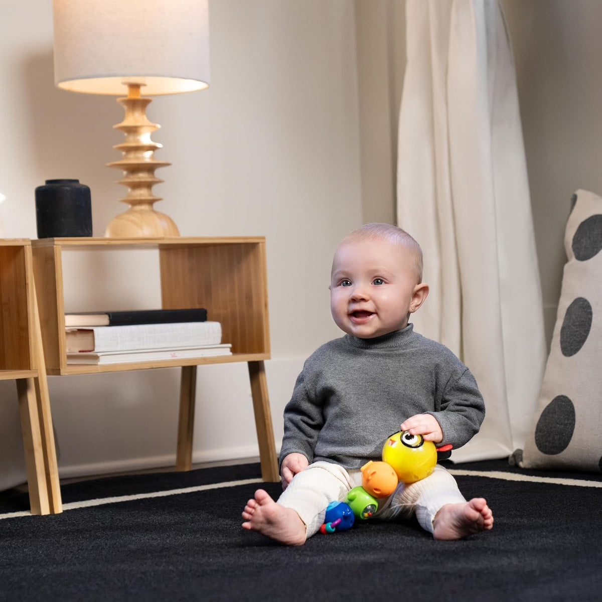 Baby Einstein Twist-a-Pal Cal - Juguete sensorial con música y caza...