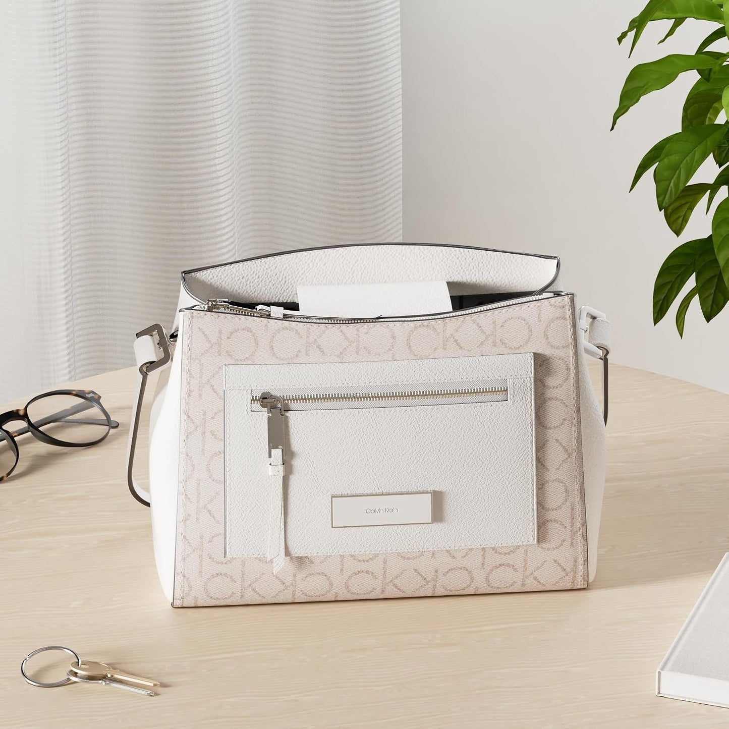 Calvin Klein Bolso bandolera Hadley con tres compartimentos para mujer