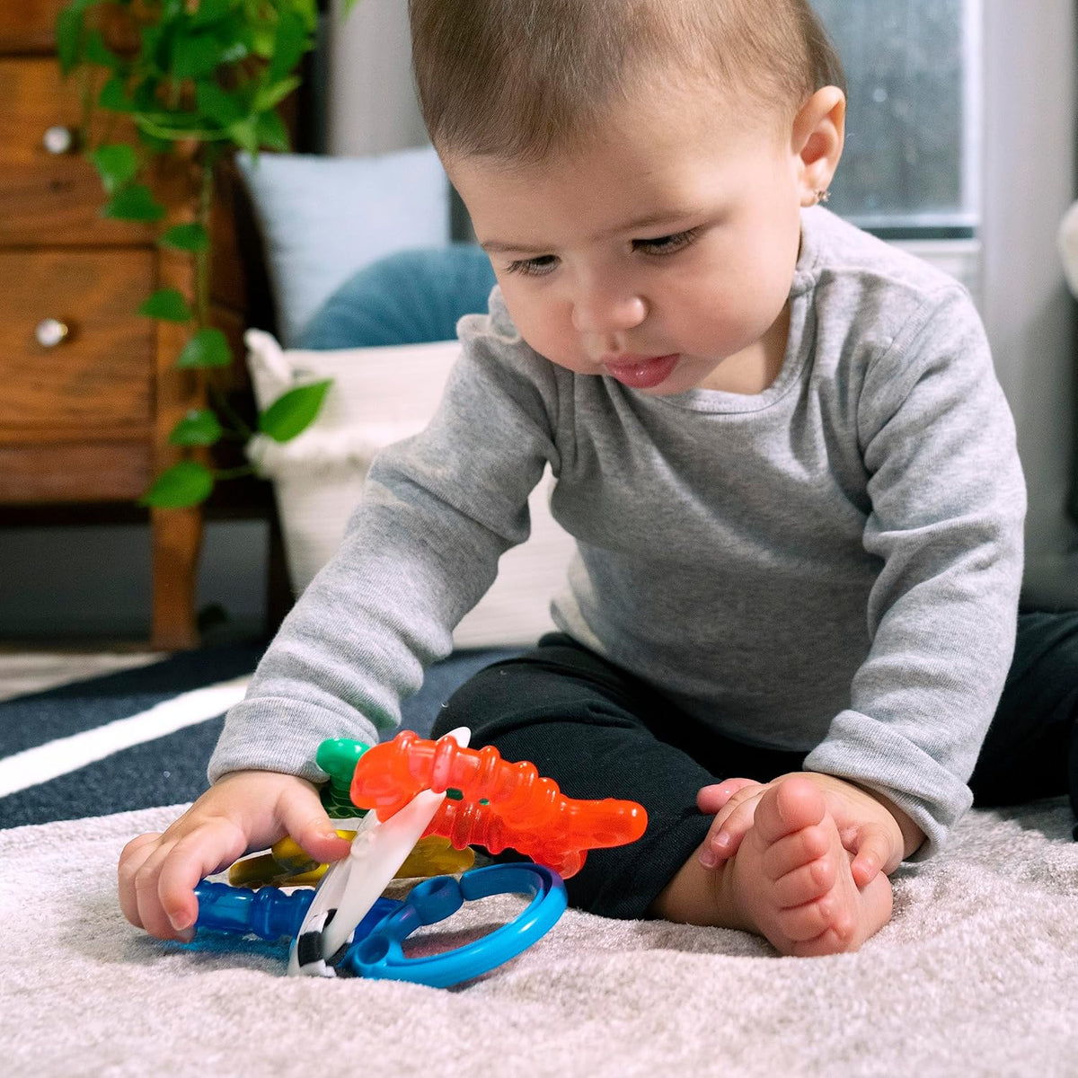 Baby Einstein Ocean Explorers Sea of Sensory - Juguete mordedor sen...